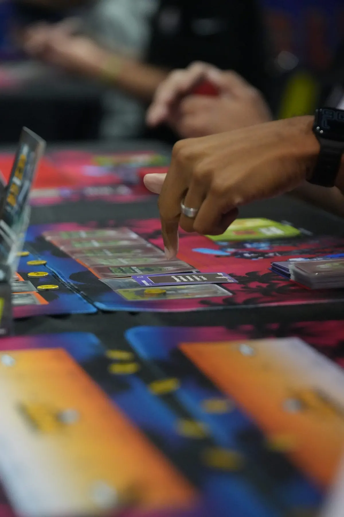 Cards on a BoBA playmat mid-game